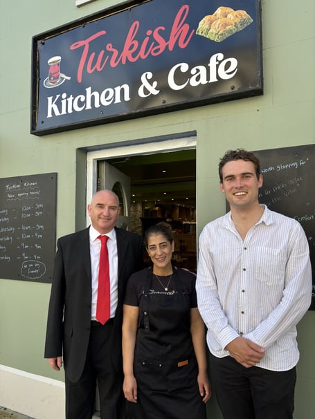 Councillor Thomas Tudor with Turkish Kitchen proprietor Hatice Eltan and Henry Tufnell MP