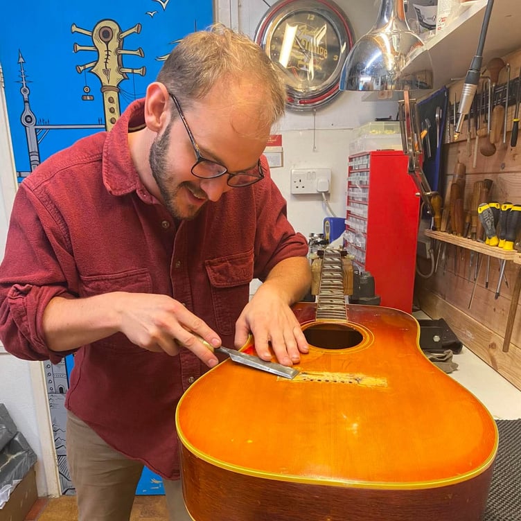 George’s expertise in guitar repairs stems from his passion for making musical instruments.