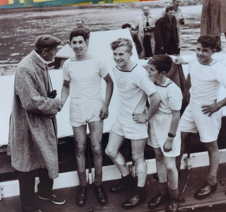 John H: The sea cadets crew are congratulated on their performance by legendary Holly-wood director John Huston (Image: Ben Masey Collection). 