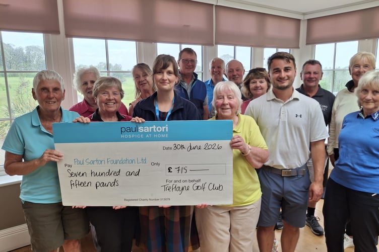 Members of the Trefloyne Golf Club present a cheque for £715 to Rosie-Faye Hart, a representative of the Paul Sartori Foundation, at Trefloyne Golf Club