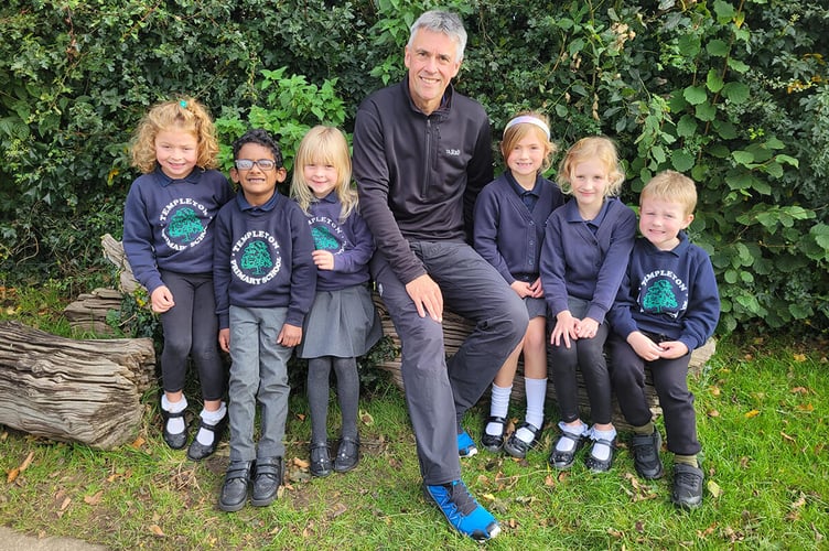 Retiring headteacher Kevin Phelps with some of the pupils at Templeton Primary School