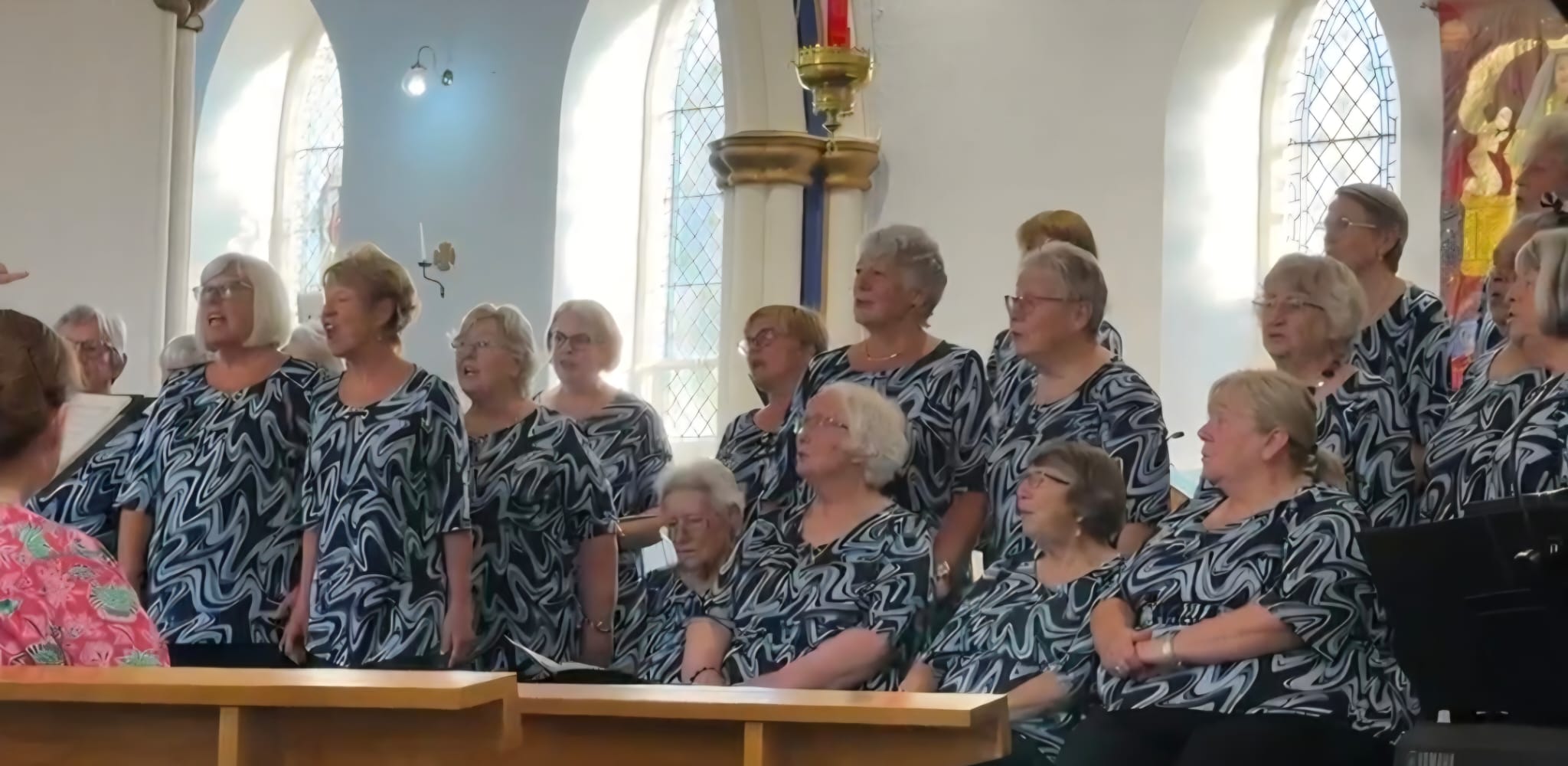 Neyland Ladies Choir performing to a full-house audience in Haverfordwest