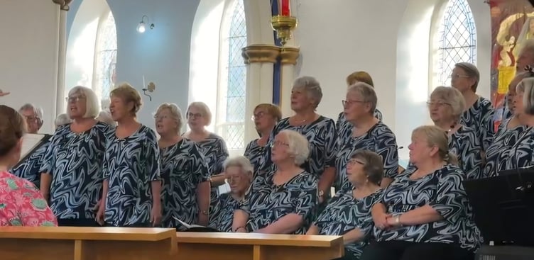 Neyland Ladies Choir performing to a full-house audience in Haverfordwest