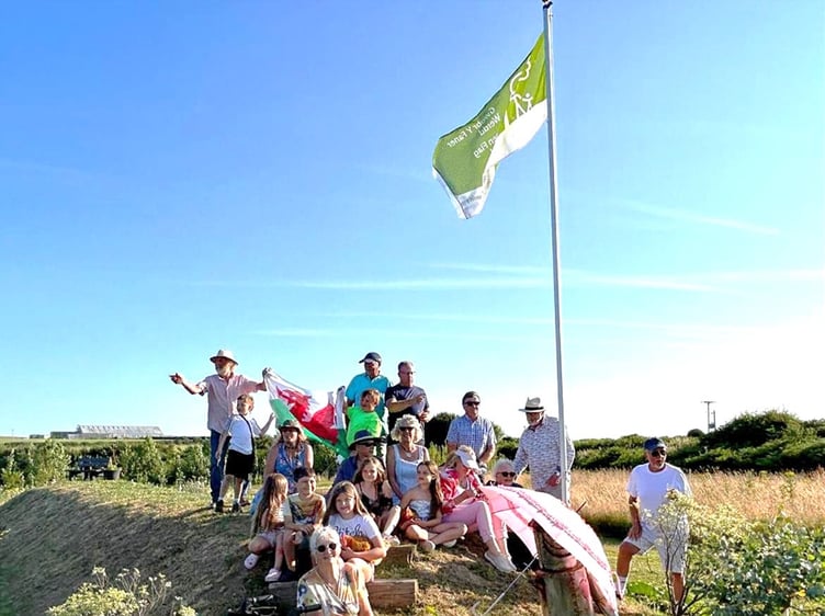 Local residents celebrate as Manorbier Community Garden receives the prestigious Green Flag Award