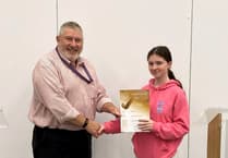 Celebrating Reg White's award for Forces support