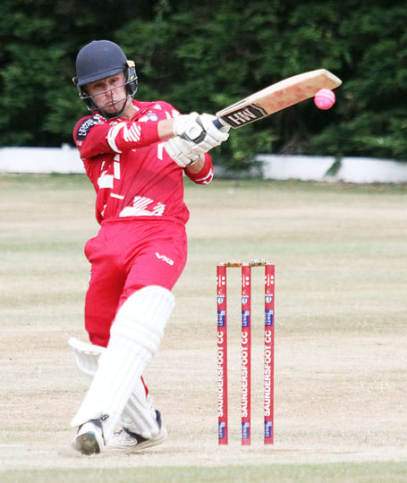 John Mansbridge on his way to score a century for Saundersfoot against Whitland