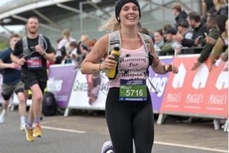 Molly Siswick ran the Swansea Half Marathon to thank Glangwili ICU for saving her mother's life.