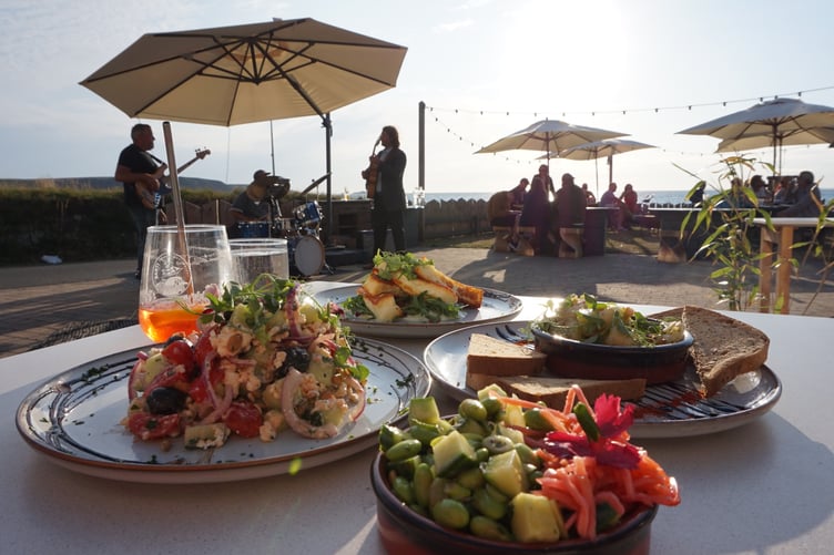 Some of the tapas on offer - a Greek salad, halloumi and pomegranates, edamame miso salad, and butter and garlic prawns.