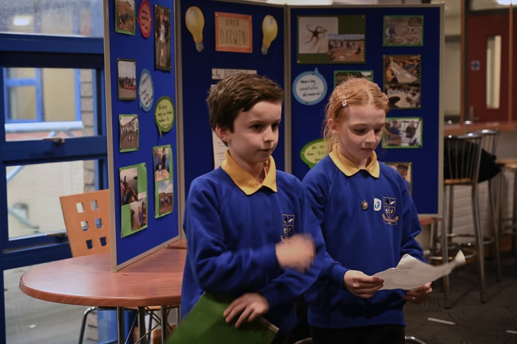 Neyland pupils presenting their school’s work with Darwin over the past 20 years