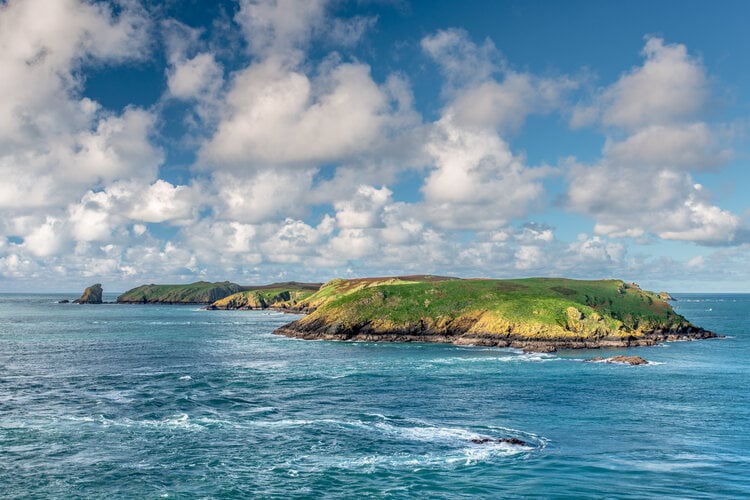 Middleholm & Skomer from mainland - credit Mike Alexander