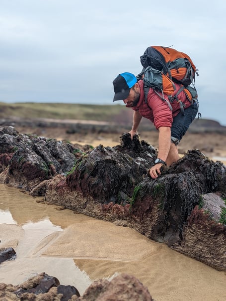 Barti Rum owner Jonathan Williams foraging for seaweed