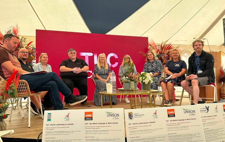 Pembrokeshire County Council and Pembrokeshire Coast National Park Authority commit to promoting Welsh language at work.