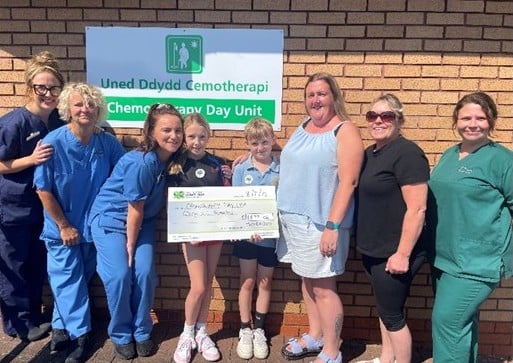 Staff with Maisie, Codi, Jodie and Jayne.
