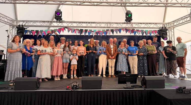 Pembrokeshire's community heroes who helped bring the National Eisteddfod to their region have been honoured at a special ceremony.
