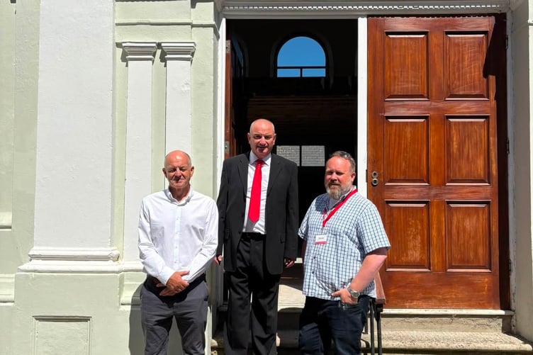 Cllr Tom Tudor, centre, at the Temperance Hall site.