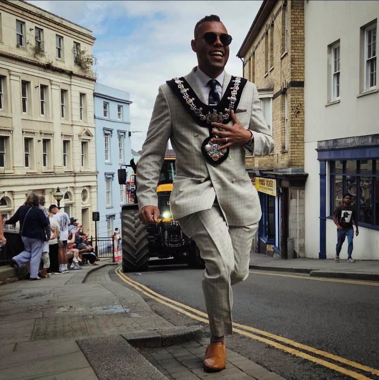 Randell Thomas-Turner, Mayor of Haverfordwest, running through town on Carnival Day, 2026