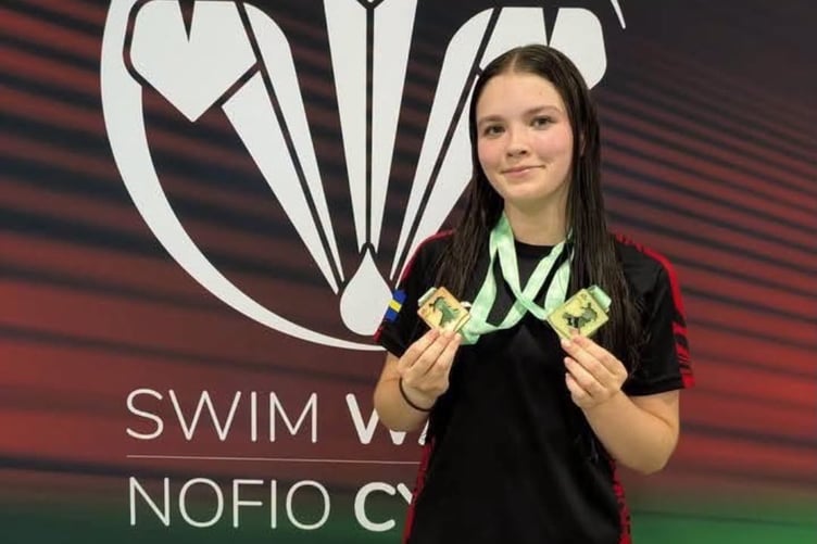 Two medals for Tenby swimmer at Swim Wales Championships. Elizabeth Davies?