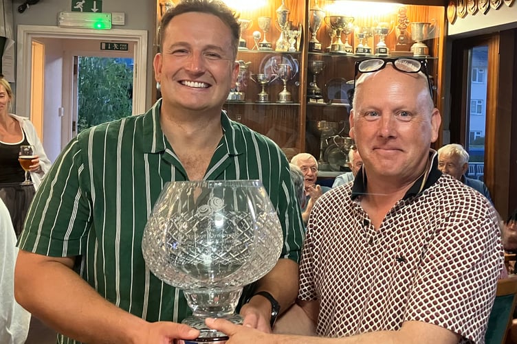 TGC's Sam Ormond, Arthur's grandson, receiving the crystal bowl from TBC's Lee Simmons