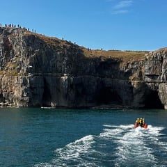 Tenby RNLI rescues two from caves