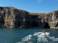 Tenby RNLI rescues two from caves
