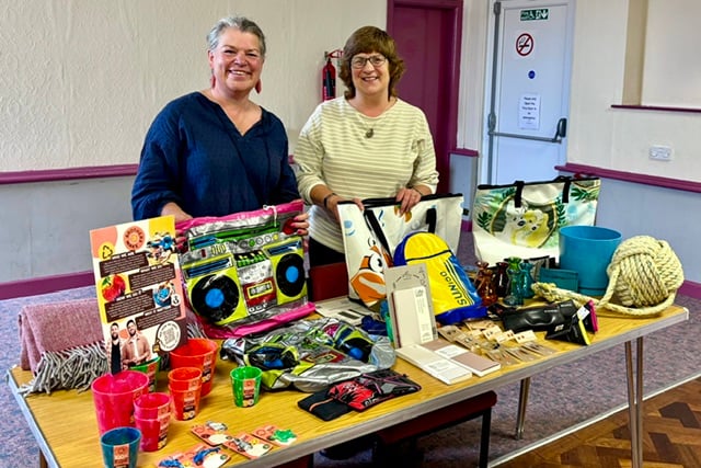 Sam of Ecoast, Saundersfoot, with Carew WI President Edith and some of the repurposed items for sale in her shop
