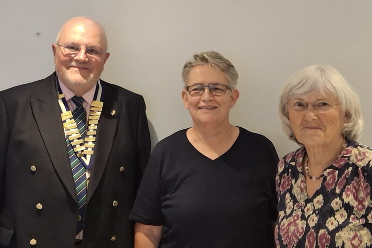 With Narberth and District Probus President David Thomas are Red Cottam and Lynda Hill, representing U3A