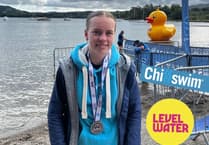 Tenby coach's epic 11-mile swim for charity