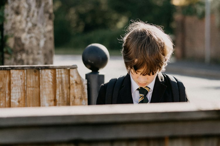 Year 7 boy in school uniform