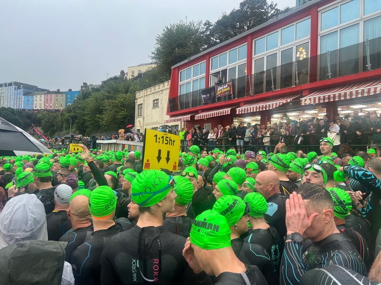 Ironman Wales 2026 competitors at the swim start on Tenby's North Beach