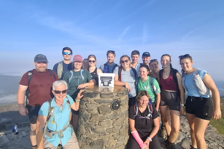 ProStock Vets staff - which has brances in both Whitland an Carmarthen left the surgery behind to tackle the Welsh 3 Peaks, raising funds for two important charities.