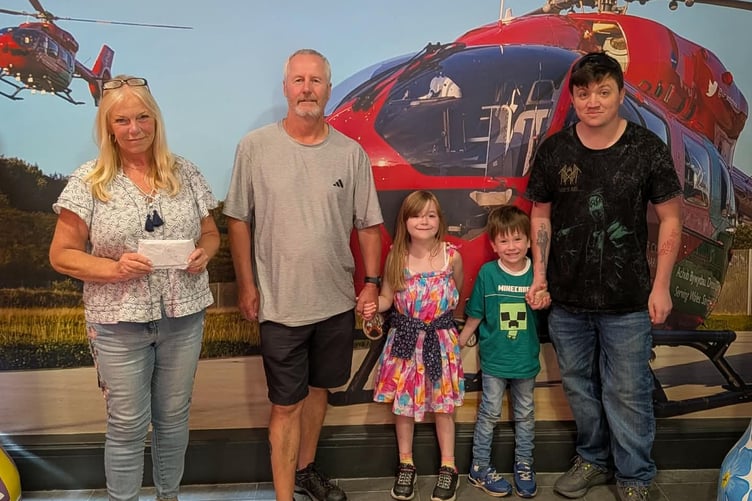 Jodie’s uncle, Alex, visited the Air Ambulance headquarters in Dafen with her brother Adam, and her nephew and niece Atlas and Lilith, to present the Charity with the donation from The Castle Golf and Leisure Club.