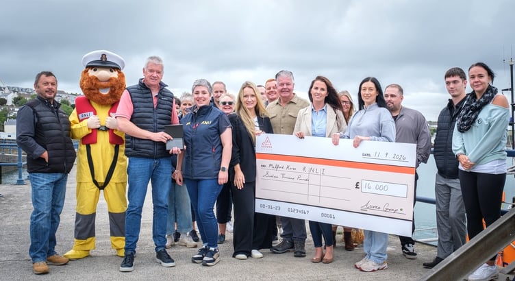 from L to R: Ascona Group Finance Director Shane Higgon, RNLI mascot Stormy Sam, Ascona CEO Darren Briggs alongside Alice Coleman and various members of the RNLI, its fundraising group and staff from Ascona.