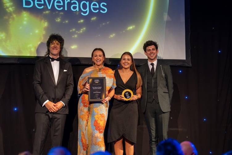 Philippa Naylor, Head of Corporate Affairs and Sustainability (second from the left) and Stephanie Rademaker, Sustainability Lead (second from the right) at Nestlé Waters & Premium Beverages UK accepting the award