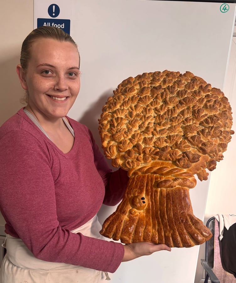 Sophie, baker at Watkins Bakery, Kilgetty with her handmade harvest loaf, the first of the year, taking pride of place at the Pembroke Dock Parish Harvest Festival