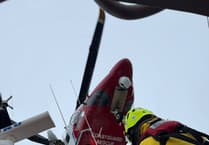 Angle Lifeboat crew assist fisherman with cardiac episode