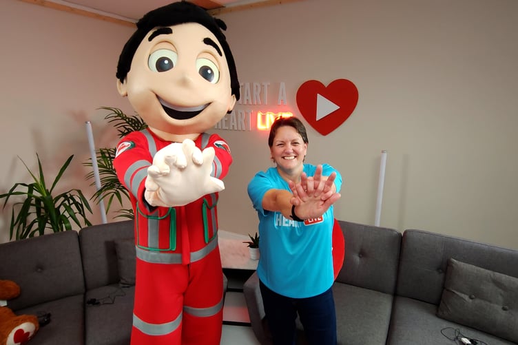 Huw Hems and Julie teaching CPR during Restart a Heart Live