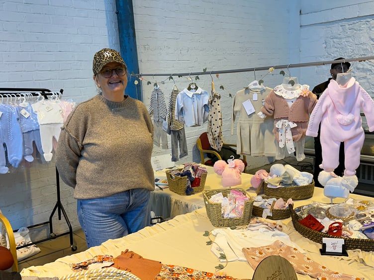 Donna Mayho at Paddy & Nellie baby clothing stall at Pembroke Dock Market