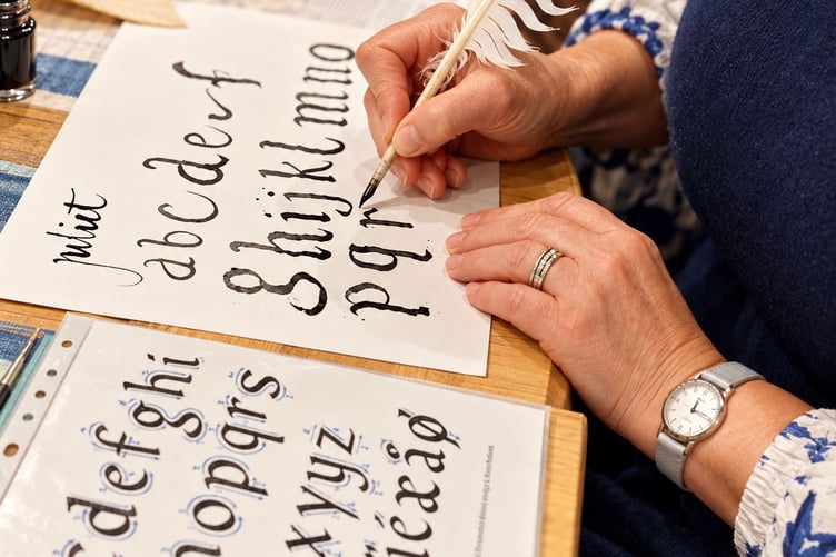 Traditional calligraphy with quill