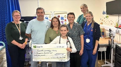 Photo 1: L-R: Dr Sian Jenkins, Consultant in General Paediatrics; Gareth Rutter; Rosa Rutter; Alice Davies; Katie Davies; Elizabeth Amery, HCSW; Jennifer Stirling, Paediatric Long Term Conditions Nurse.