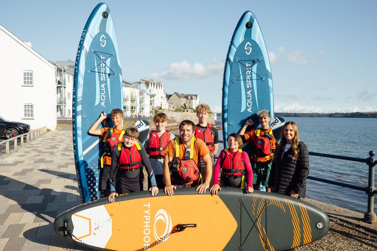 Young people enjoying water activities at Milford Haven thanks to High Tide Club.