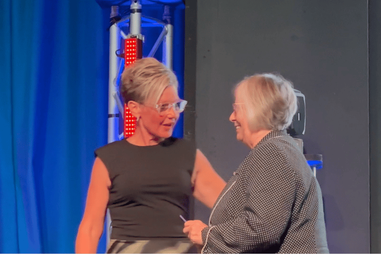 Tenby Observer Community Kindness Awards: Cllr Sam Skyrme-Blackhall welcomes Ellen Powling to the stage for her award