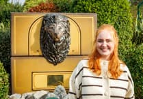 Folly Farm unveils local art student’s memorial to lion Hugo