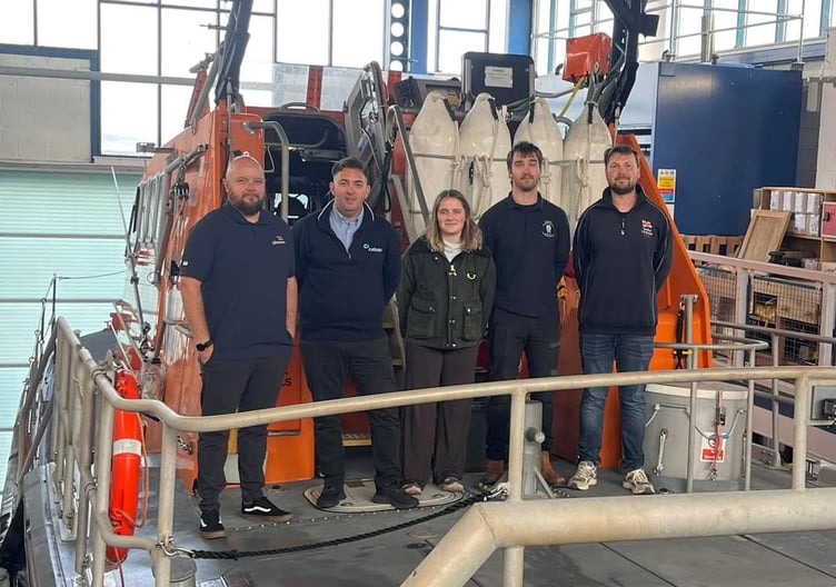 Four members of Tenby RNLI's lifeboat crew have passed out with new qualifications after months of hard work and training