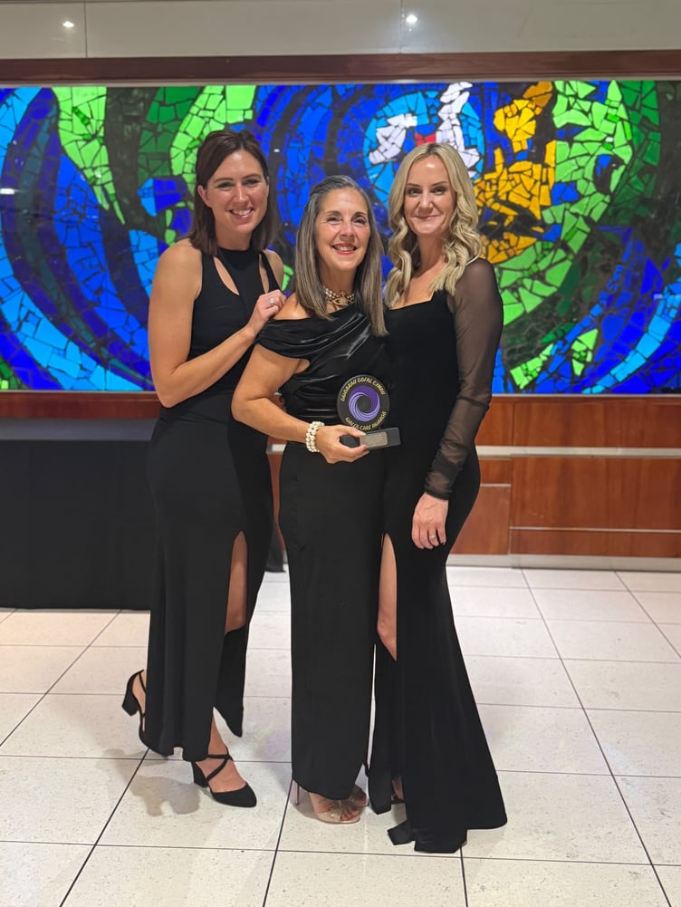Gold Award winner Sandra White with head of business development for Action for Children, Megan Ludlow (left) and Action for Children's national director for Wales, Laurie Ryall