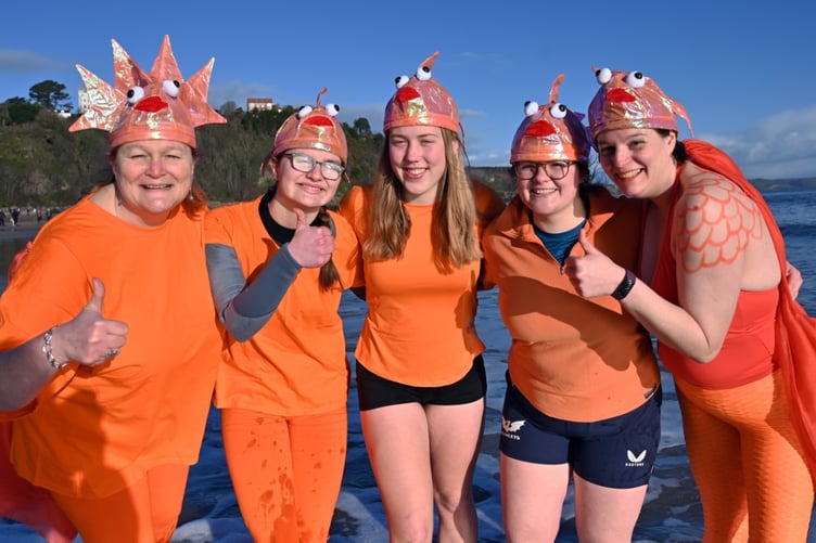 The 2026 Tenby Boxing Day Swim will have an 'all things seaside' fancy dress theme (Photo by Gareth Davies Photography)