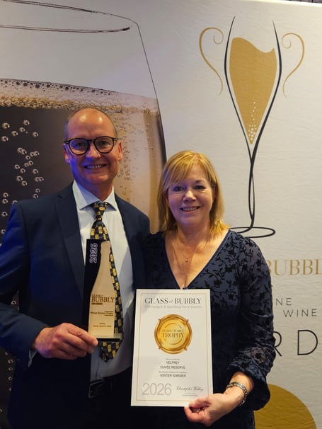 Andy and Fiona Mounsey with the Glass of Bubbly 2026 'Winter Warmer' Trophy and Certificate