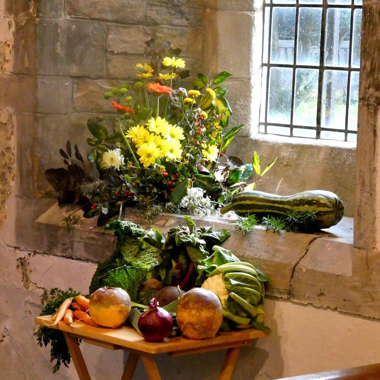 Displays of flowers and produce at St Issell’s Church for its harvest festival