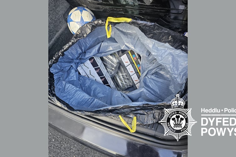 A multi-agency operation in Carmarthenshire has resulted in the seizure of thousands of illegal cigarettes and the arrest of several people