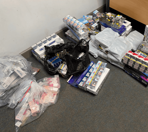 A multi-agency operation in Carmarthenshire has resulted in the seizure of thousands of illegal cigarettes and the arrest of several people